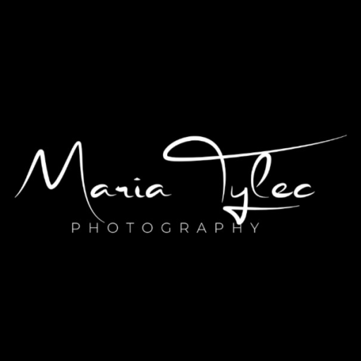 A logo of a professional photographer in Wolverhampton, on a black background, featuring the white handwritten text "Maria Tylec."